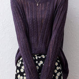 Hollowed-out knitted blouse