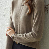 Half turtleneck knitted sweater.