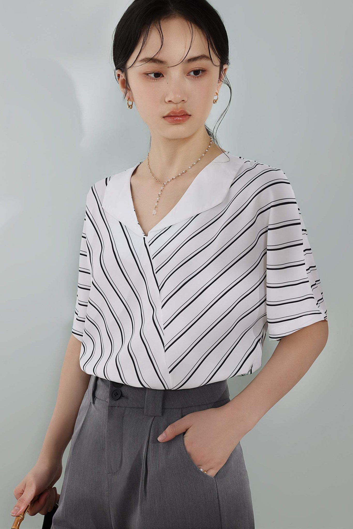 Triangle color diamond striped blouse