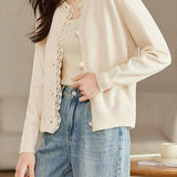 Lace-trimmed short knitted cardigan