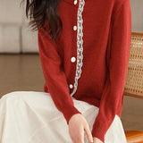 Lace-trimmed short knitted cardigan