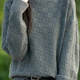 Half turtleneck solid-color sweater with square decorations