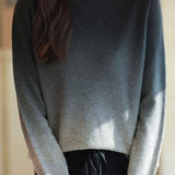 Round-neck gradient knitted sweater.