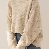 Round-neck hollowed-out knitted sweater