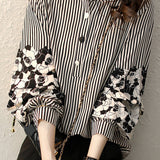 Striped lantern-sleeve shirt that is slimming and all-match