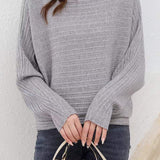 Batwing-sleeved striped knitted top