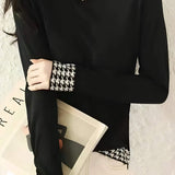 Houndstooth half-turtleneck knitted sweater