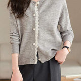 Lace-trimmed short knitted cardigan