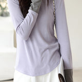 Knitted sweater in fake two-piece style with color-blocking splicing