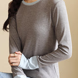 Knitted sweater in fake two-piece style with color-blocking splicing